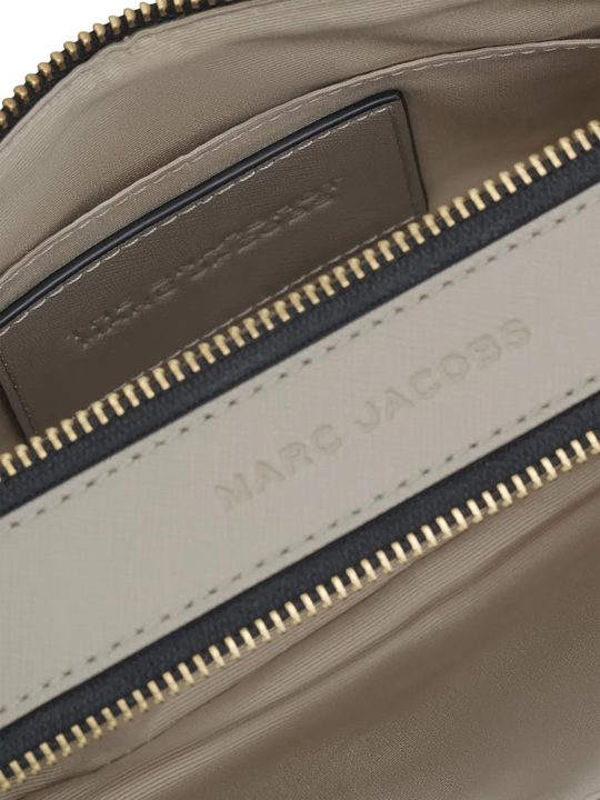 close up of grey  bags, showing texture of the leather fabric