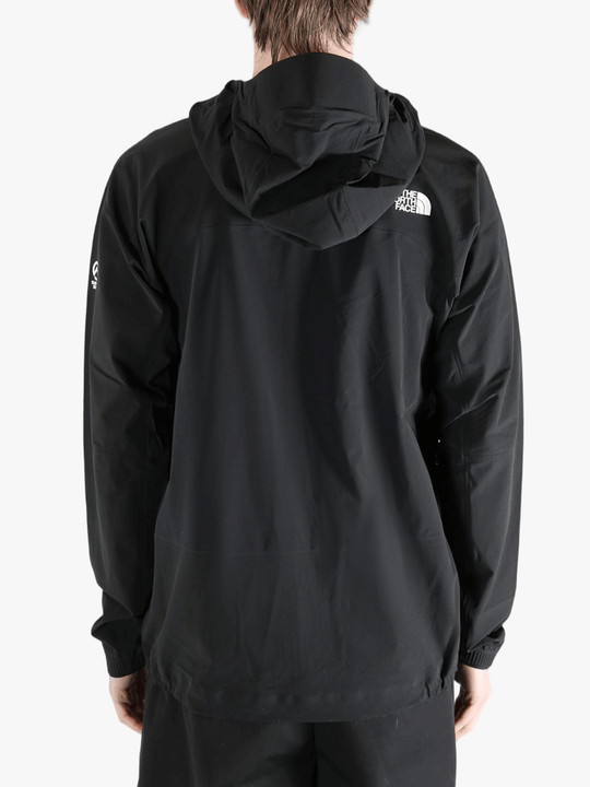 Black jacket worn by a person, showing the jacket's fit