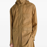 Brown jacket worn by a person, showing the jacket fit