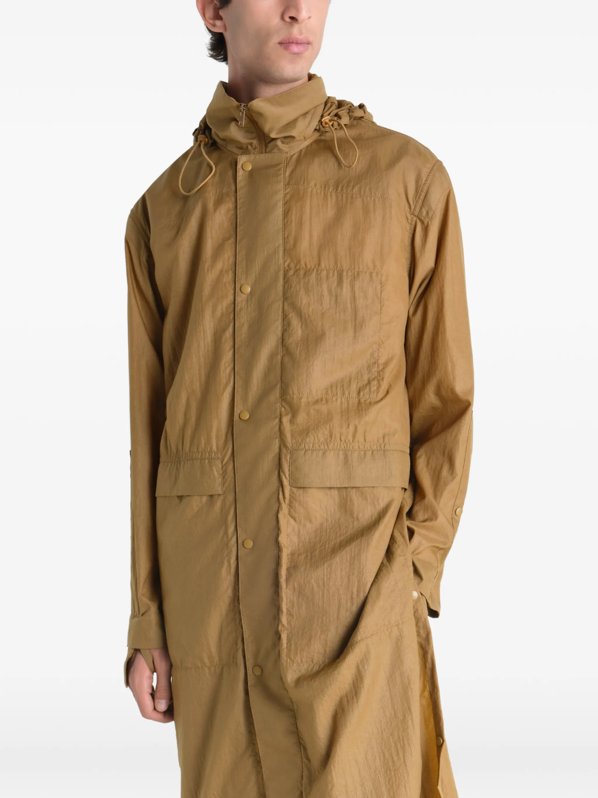 Brown jacket worn by a person, showing the jacket fit