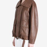 Brown jacket worn by a person, showing the jacket fit