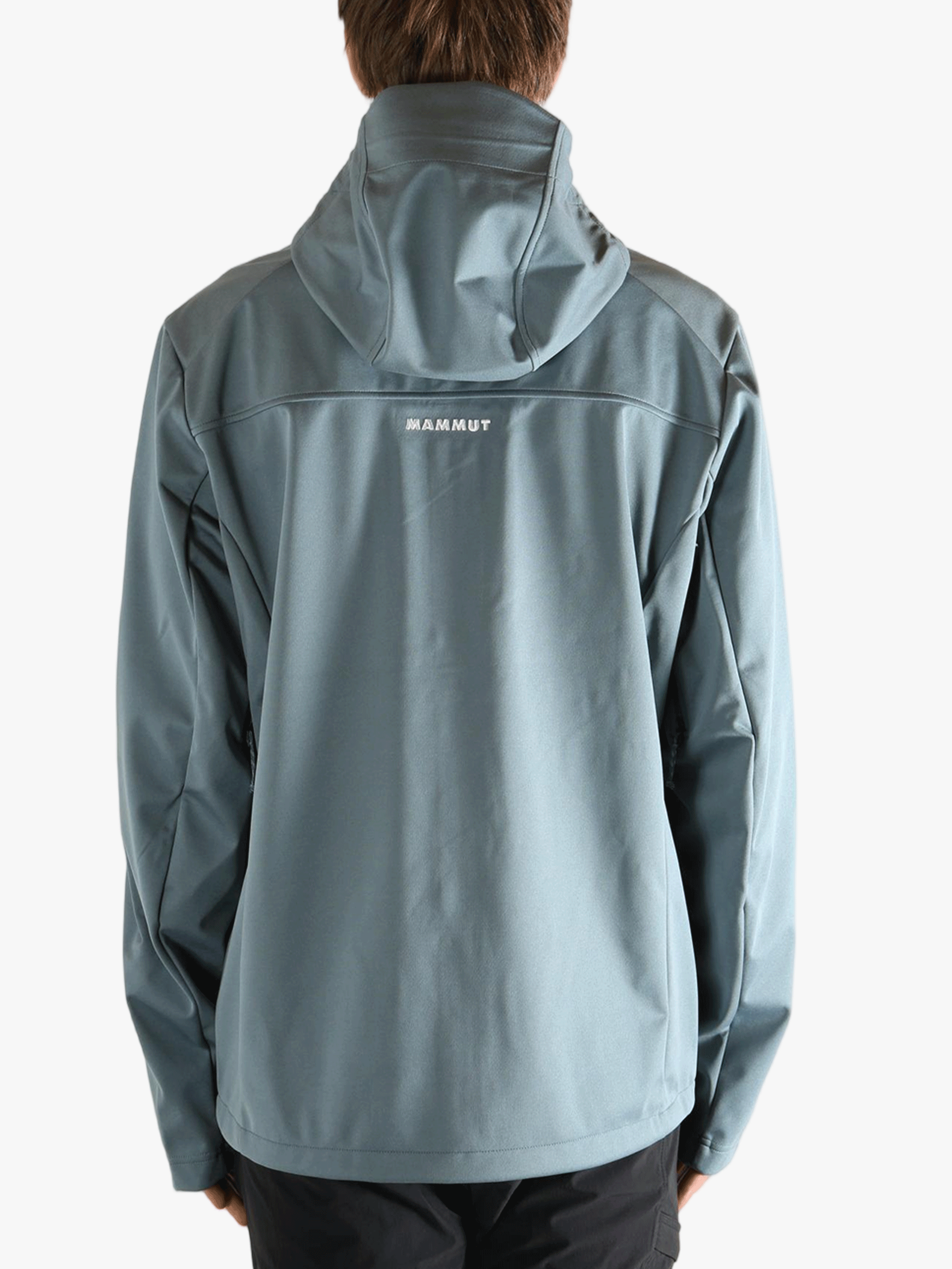 Blue jacket worn by a person, showing the jacket's fit