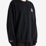 Black hoodie worn by a person, showing the hoodie fit