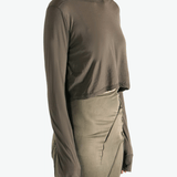 Brown t-shirts worn by a person, showing the t-shirts fit