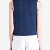 Navy top worn by a person, showing the top fit