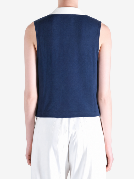 Navy top worn by a person, showing the top fit