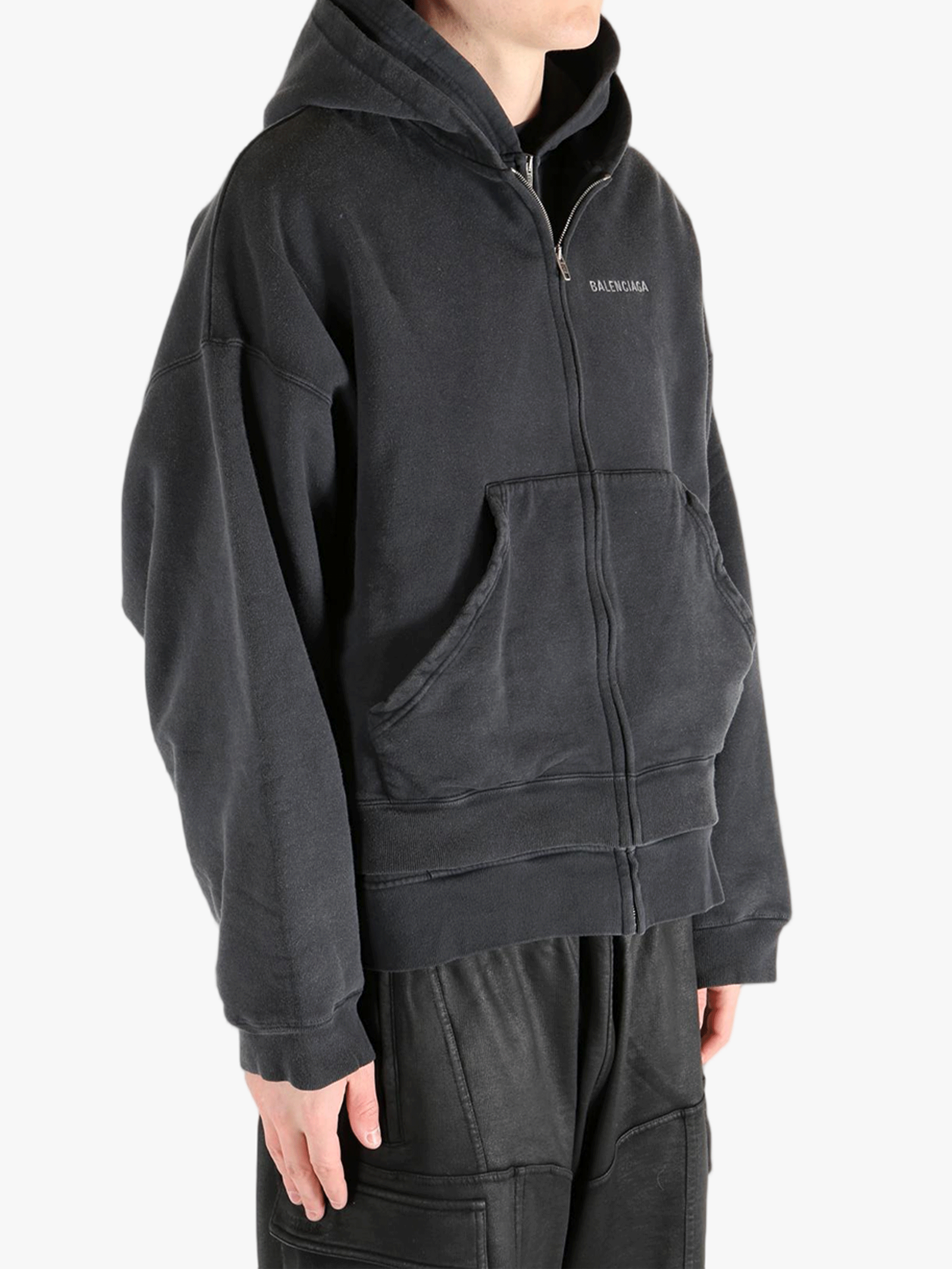 Black jackets worn by a person, showing the jackets fit