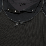 Close up of Black t-shirt, showing texture of the 100% cotton fabric