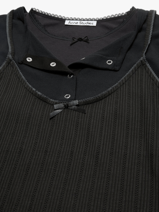 Close up of Black t-shirt, showing texture of the 100% cotton fabric