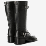 Black boots, back view