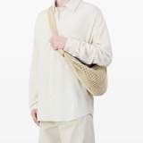 Tan bags, full body view