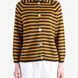 Brown knitwear worn by a person, showing the knitwear fit