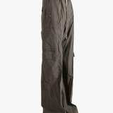 Grey pants worn by a person, showing the pants fit