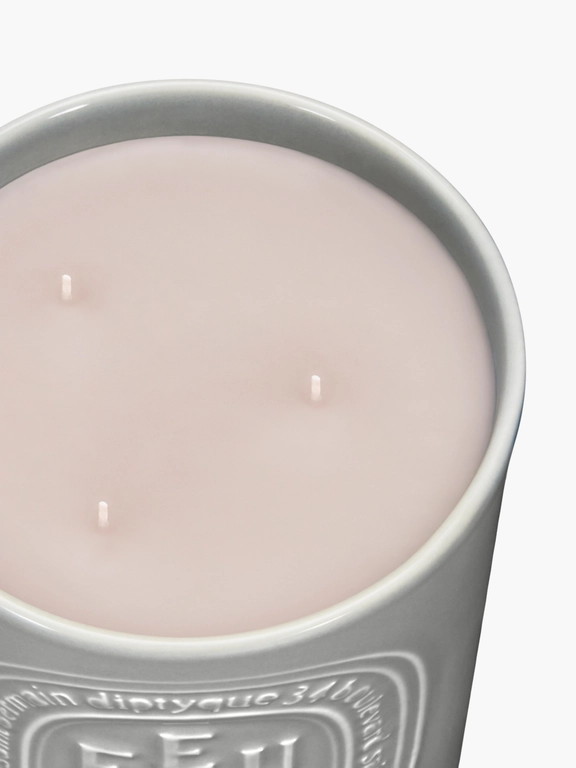 Close up of grey candles, showing texture of the fabric