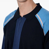 Navy knitwear worn by a person, showing the knitwear fit