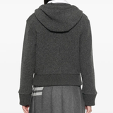 Grey jacket worn by a person, showing the jacket's fit