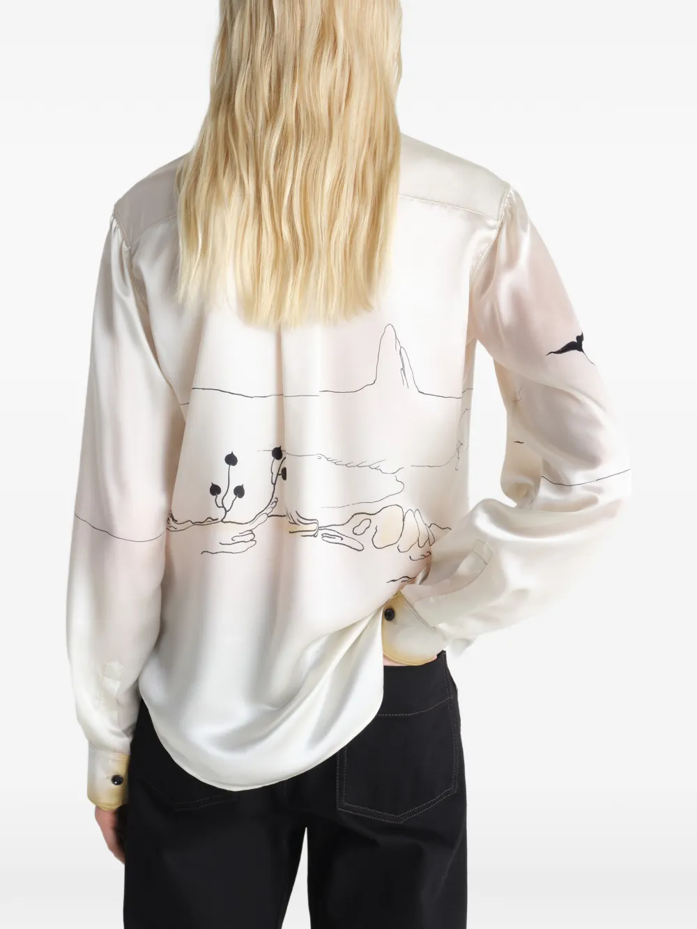 White shirts worn by a person, showing the shirts's fit