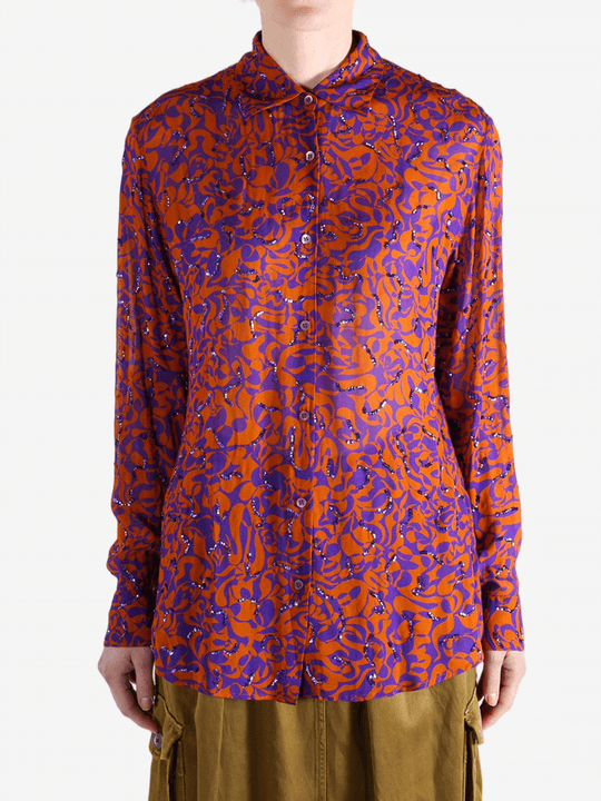 Red top worn by a person, showing the top fit