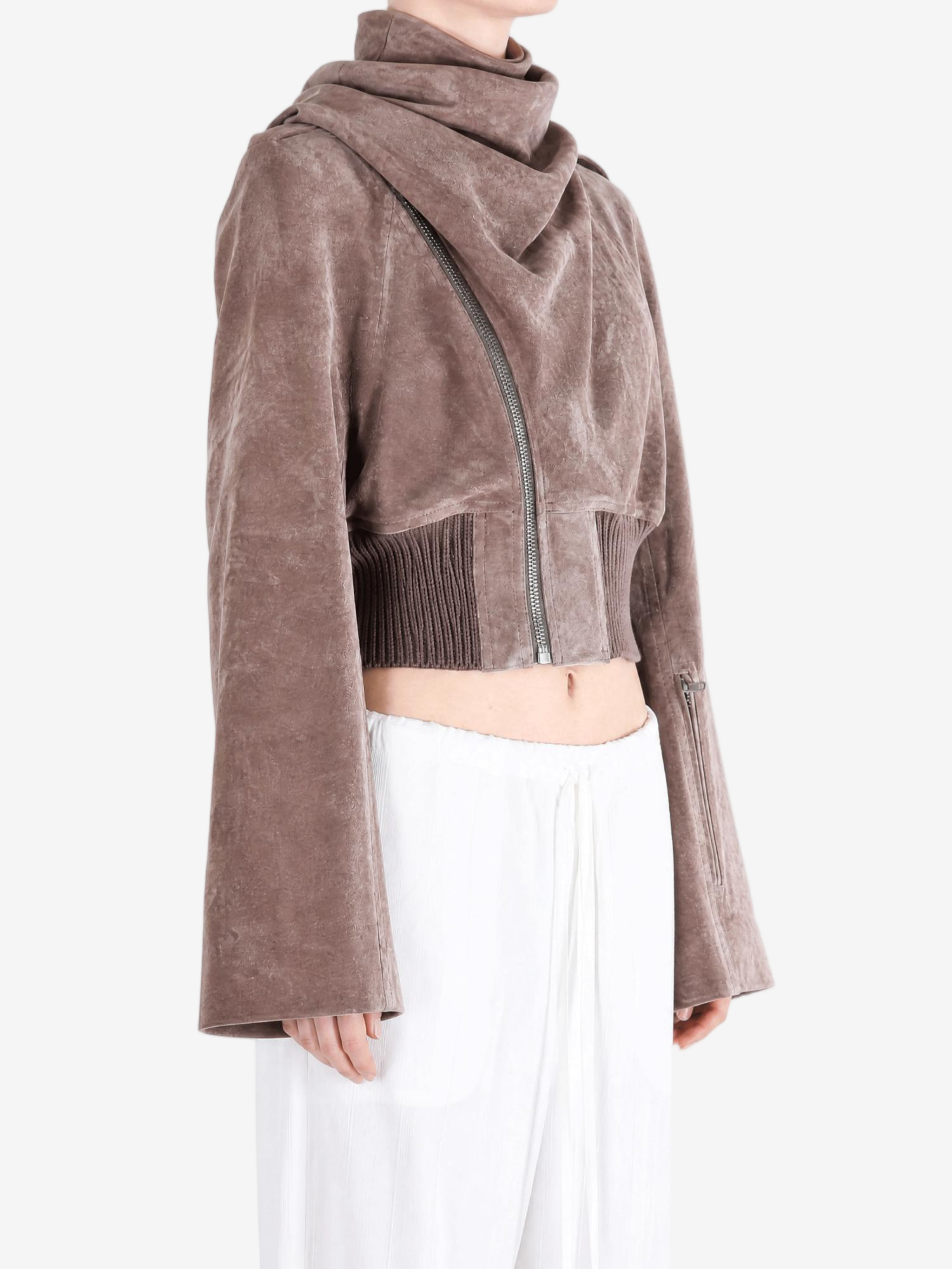 Brown jacket worn by a person, showing the jacket fit