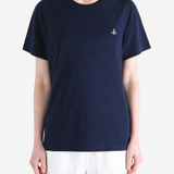 Navy shirt worn by a person, showing the shirt fit