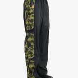 Green pants worn by a person, showing the pants fit
