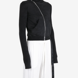 Black hoodie worn by a person, showing the hoodie fit