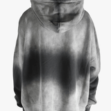 Black hoodies worn by a person, showing the hoodies fit