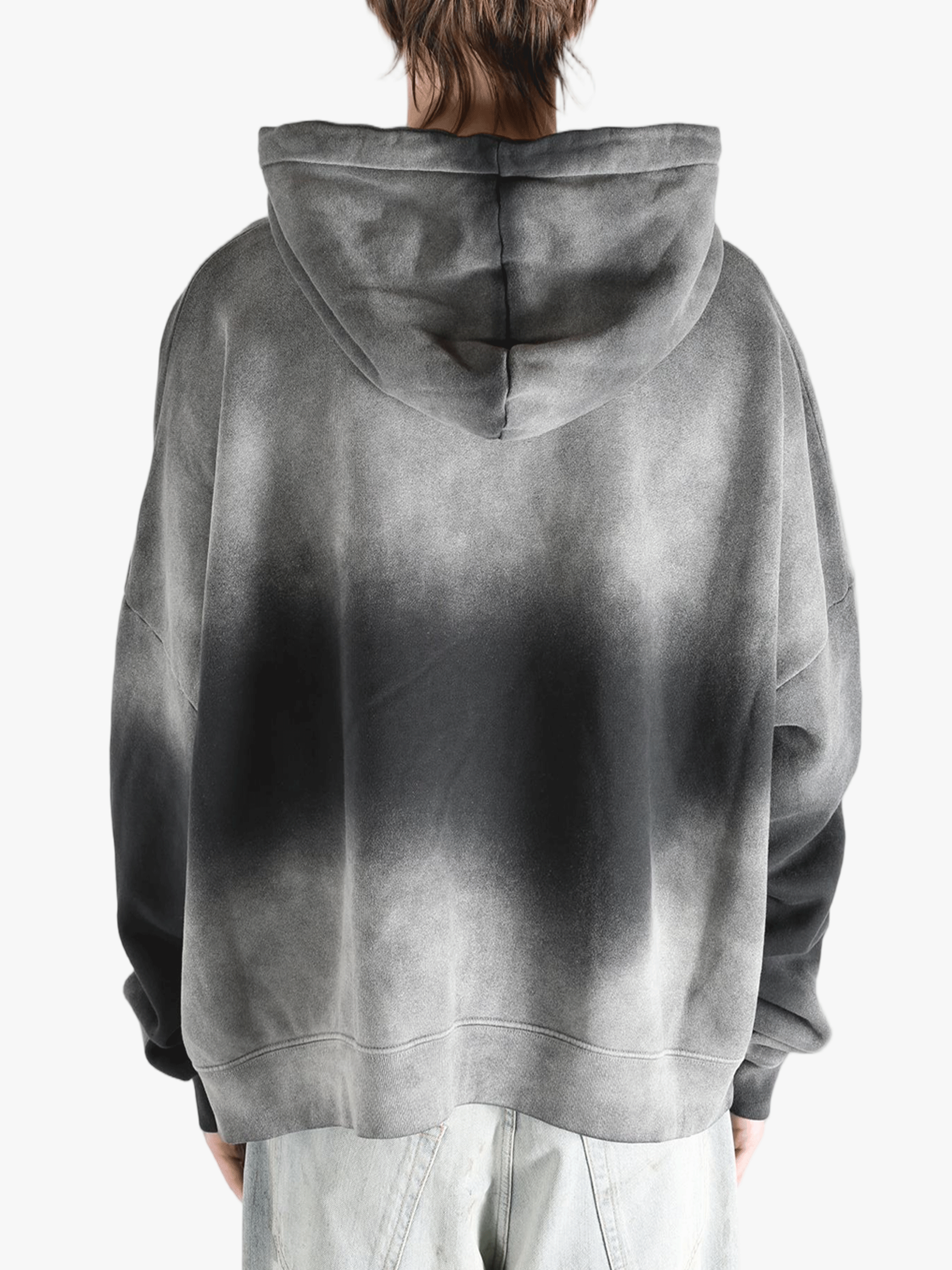 Black hoodies worn by a person, showing the hoodies fit