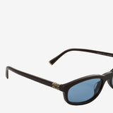 Close up of the brown pant, showing texture of the acetate fabric