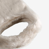 Close up of the white bag, showing texture of the leather fabric