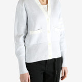 Gray cardigan worn by a person, showing the cardigan fit