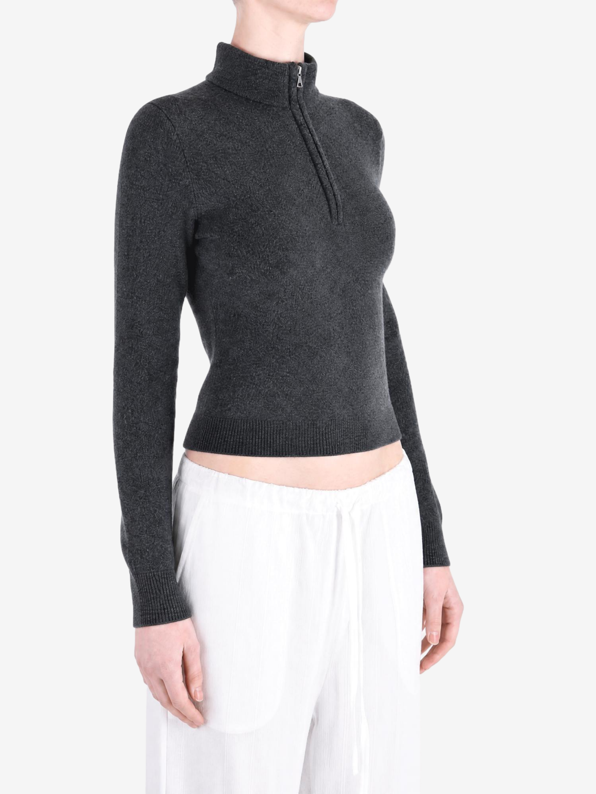 Grey top worn by a person, showing the top fit