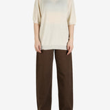 White top, full body view