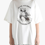 White t-shirt worn by a person, showing the t-shirt's fit