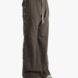 Brown pant worn by a person, showing the cotton fit