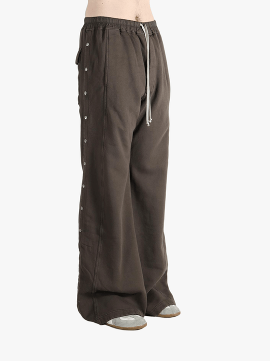 Brown pant worn by a person, showing the cotton fit