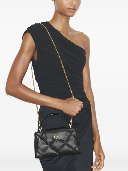 Black bag worn by a person,showing the bag fit