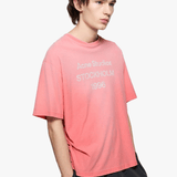 Pink t-shirt worn by a person, showing the t-shirt fit