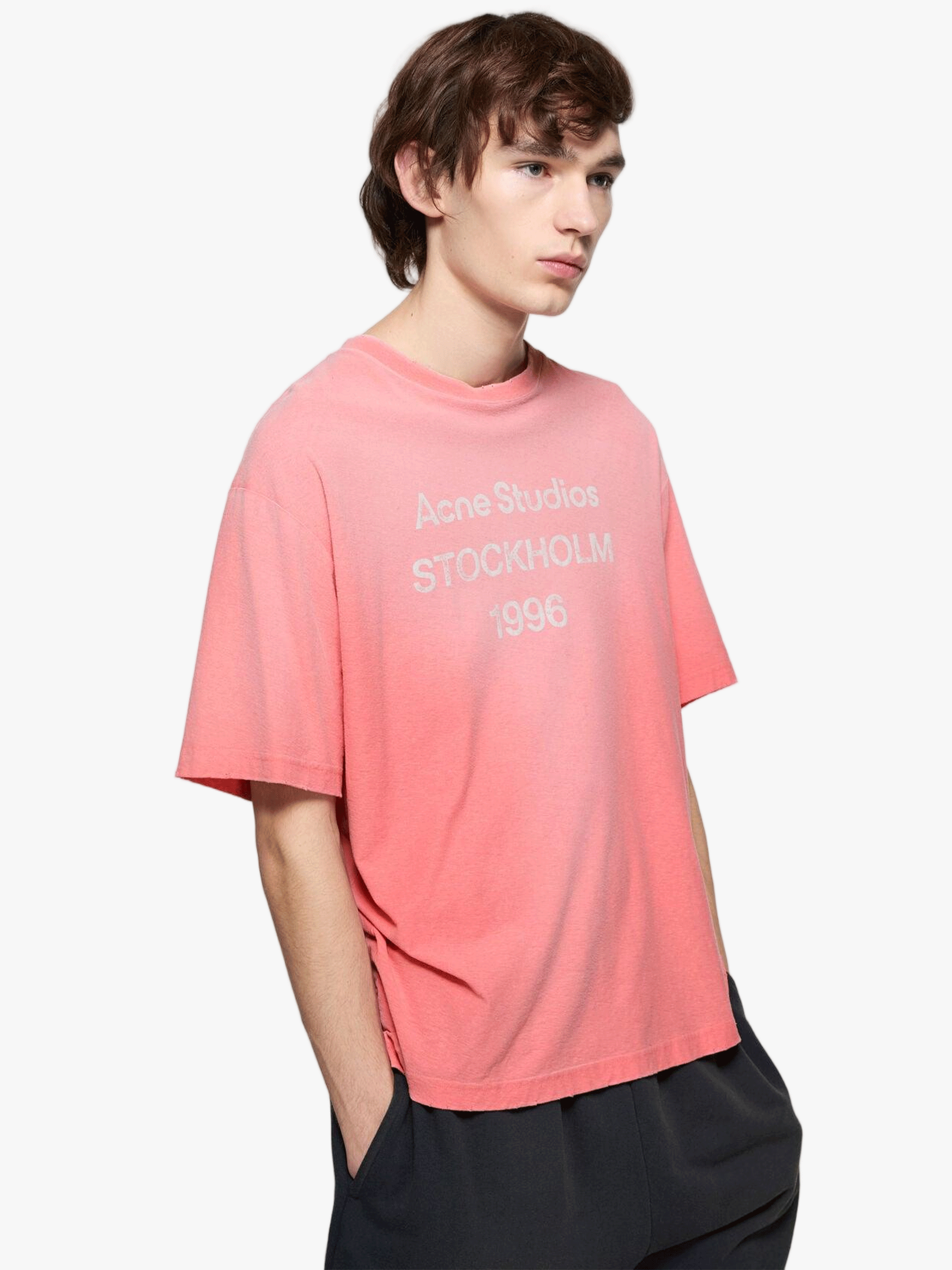 Pink t-shirt worn by a person, showing the t-shirt fit