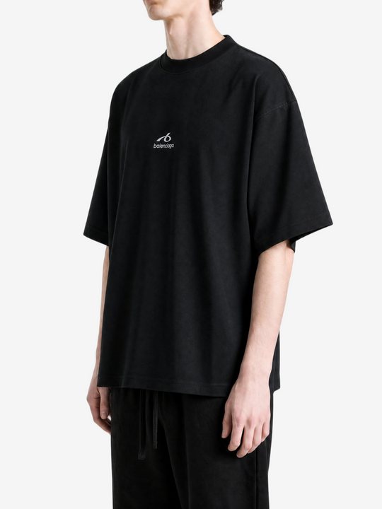 Black t-shirt worn by a person, showing the t-shirt fit