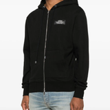 Black hoodie worn by a person, showing the hoodie's fit