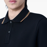 close up of black shirts, showing texture of the cotton fabric