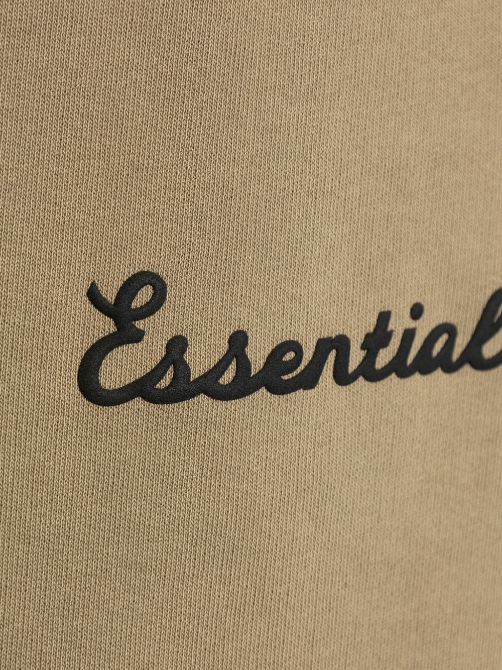 Close up of tan pants, showing texture of the cotton fabric