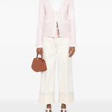 Pink knitwear, full body view