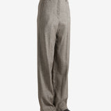 Brown pants worn by a person, showing the pant's ift
