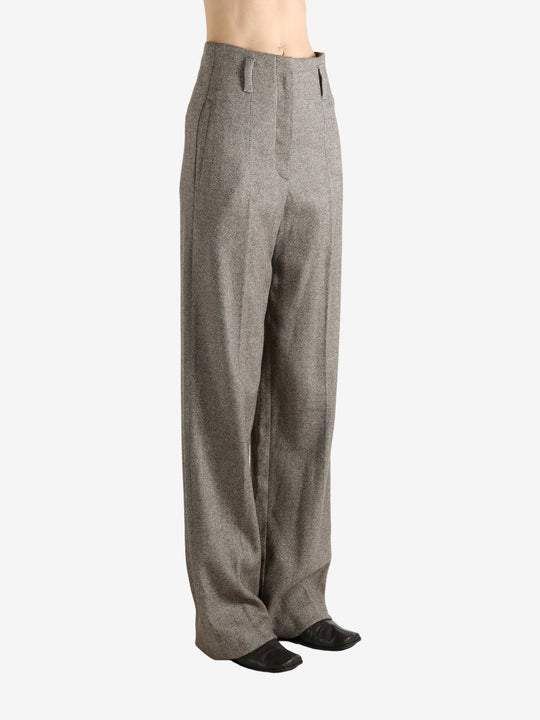 Brown pants worn by a person, showing the pant's ift