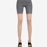 Grey pant worn by a person, showing the pant's fit