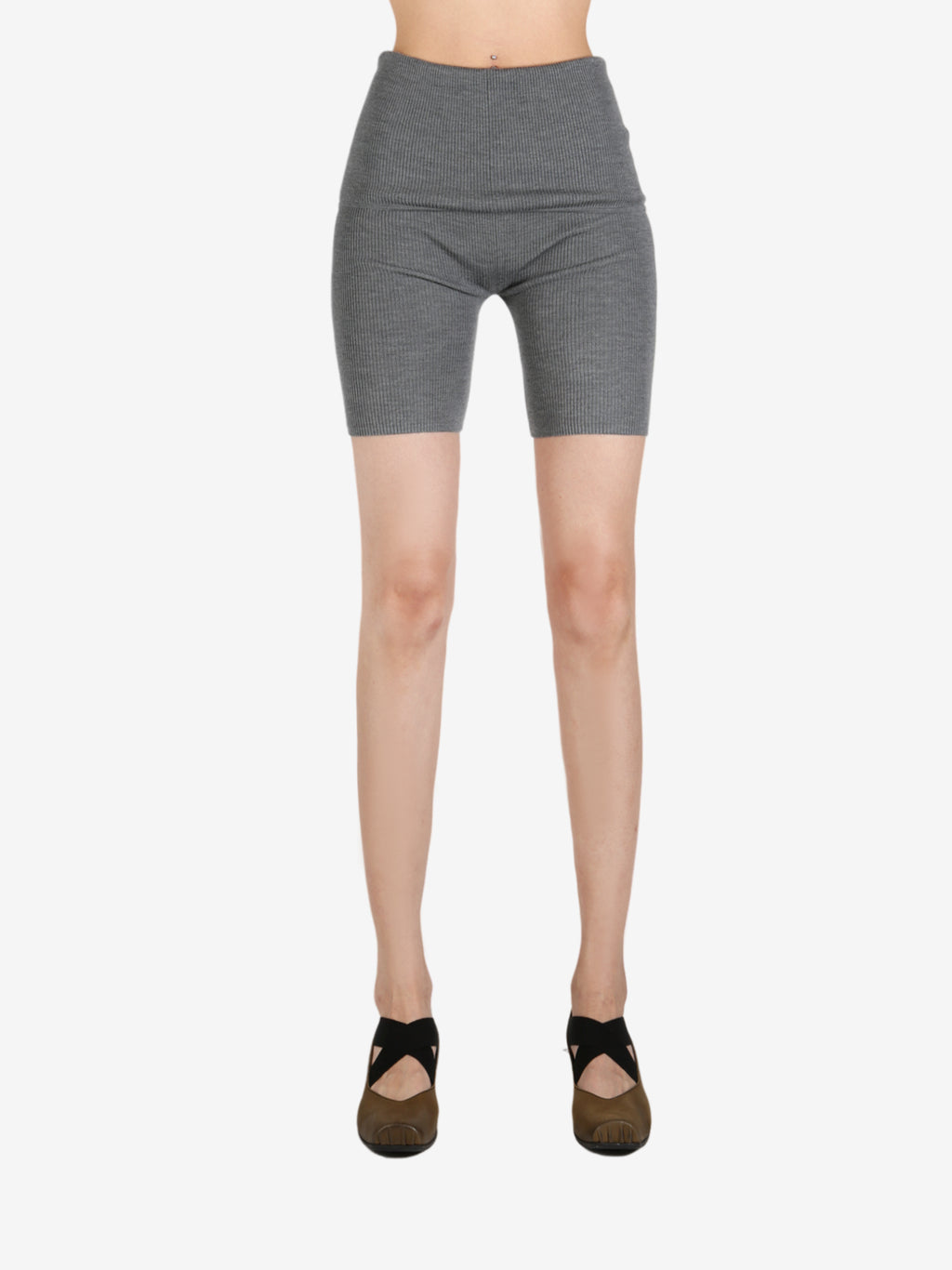Grey pant worn by a person, showing the pant's fit