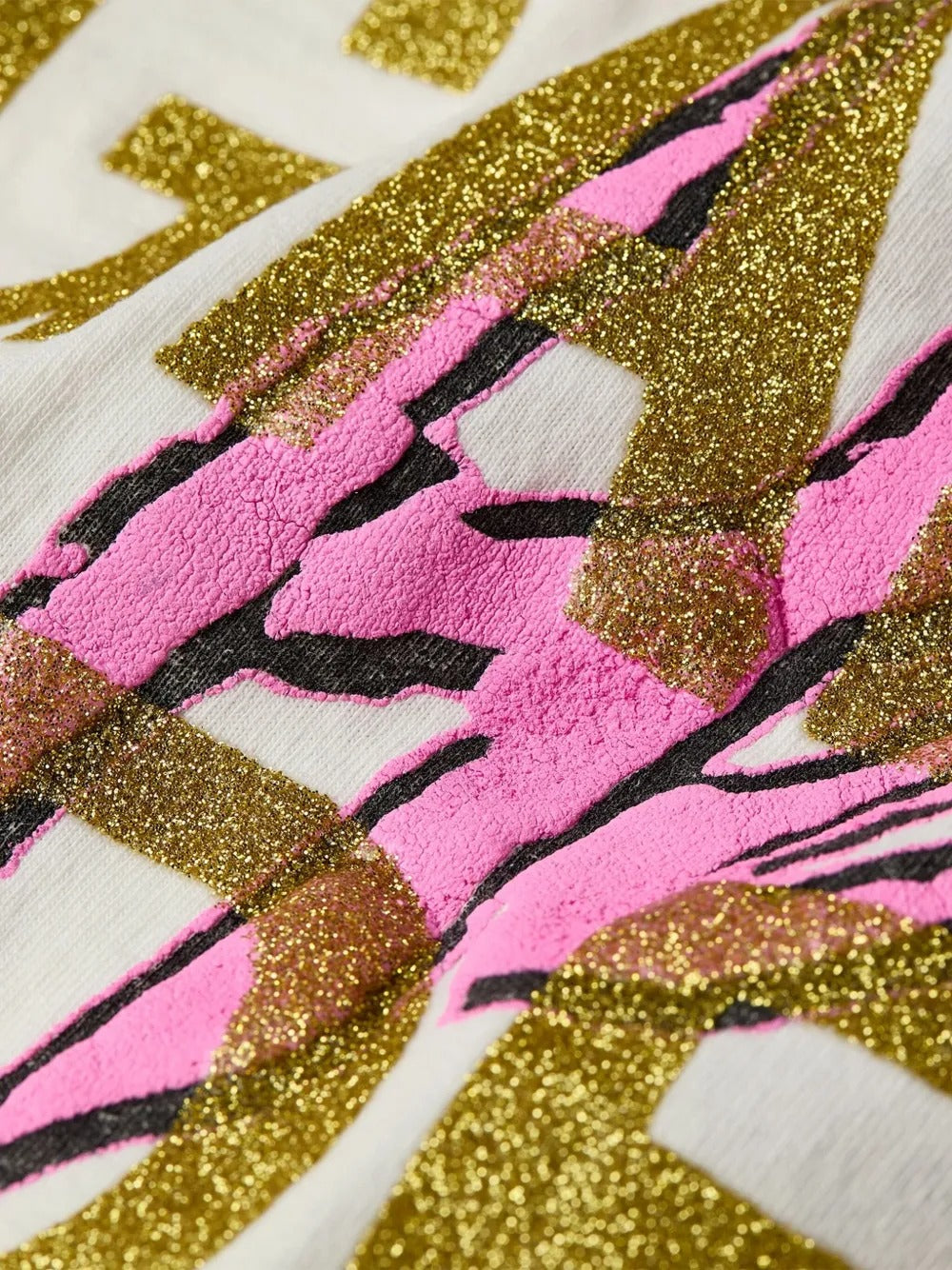 Cloes-up of white T-shirts, showing texture of the cotton fabric