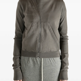 Grey sweat worn by a person, showing the sweat fit